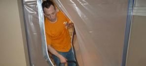 Water Damage Lakeside Technician Using Air Mover Near Vapor Barrier