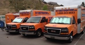 Water Damage Lakeside Vans And Trucks At Job Site